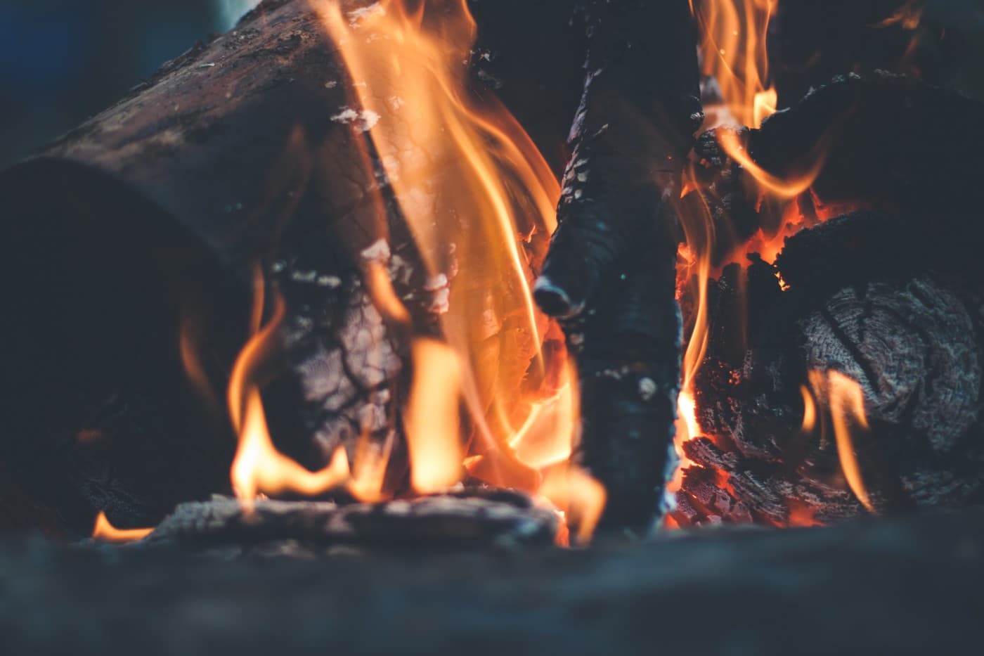 Open fire burning in the pub — logs and flames